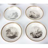 A Spode bat printed part tea service, circa 1815, with rural views and gilt rims, pattern no.