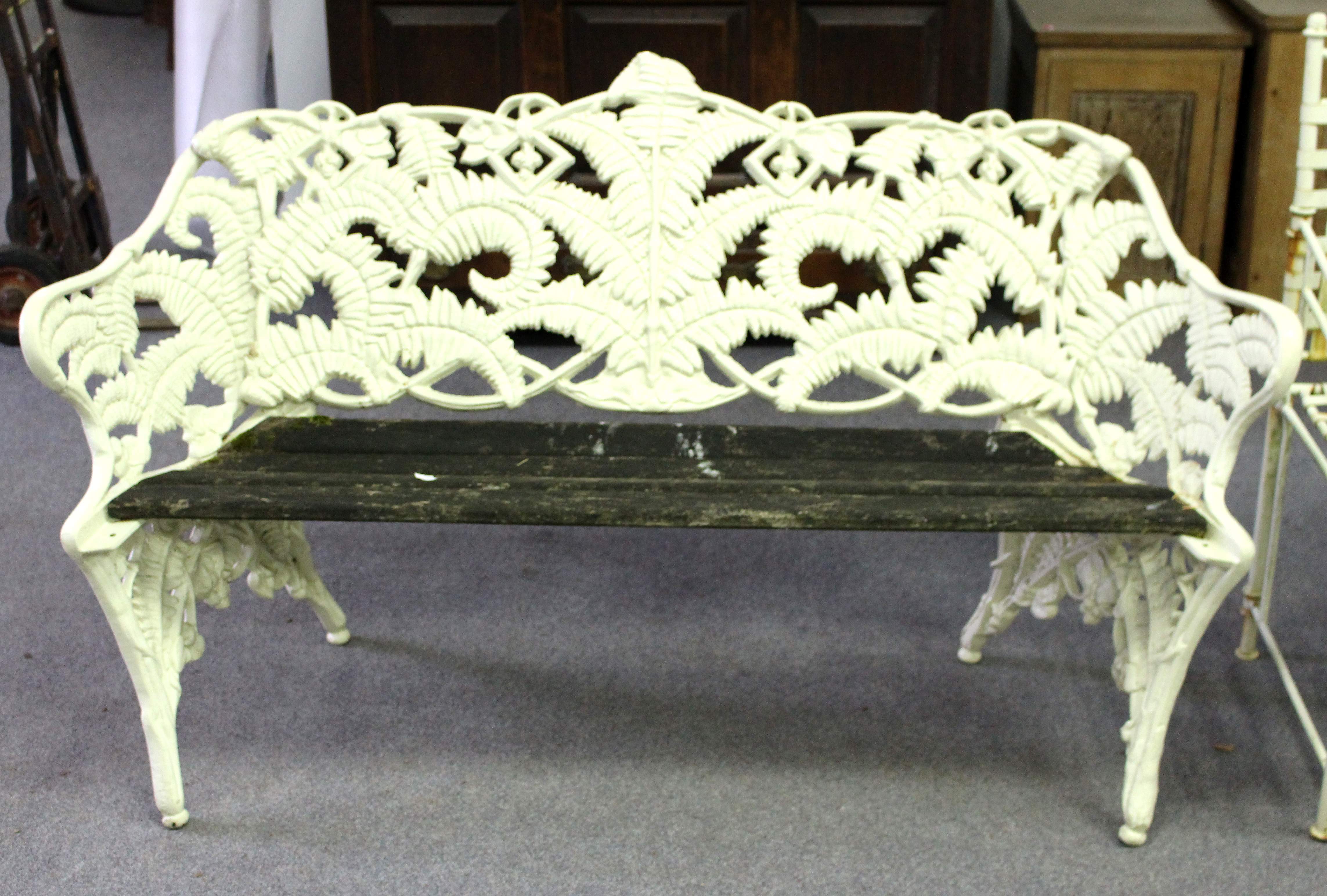 A fern pattern cast iron garden seat in the style of Coalbrookdale, with slatted wooden seat, - Image 2 of 3