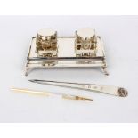 A silver inkstand, Barker Bros., Chester 1923, fitted two inkwells, 15.