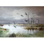 Roland Green (British 1896-1972)/Mallards in Flight over Marshland/signed lower right/watercolour,