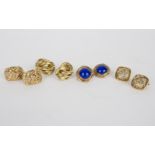 A pair of lapis lazuli cabochon ear clips of circular form set in 9ct gold,