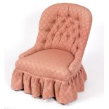 A Victorian button back chair on turned front legs/Provenance: Beverston Castle