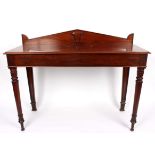 A 19th Century mahogany serving table with triangular backboard, fitted a drawer to the freeze,