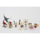 A collection of miniature porcelain figures, birds, etc.