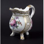 A Sèvres baluster cream jug, the porcelain 18th Century, gilding later,