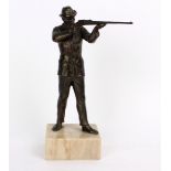 A German bronzed figure of a rifleman, early 20th Century, on a square plinth,