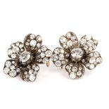 A pair of 19th Century diamond flowerhead cluster ear clips, the clips of later manufacture,