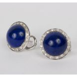 A pair of lapis and diamond ear clips of cluster form,