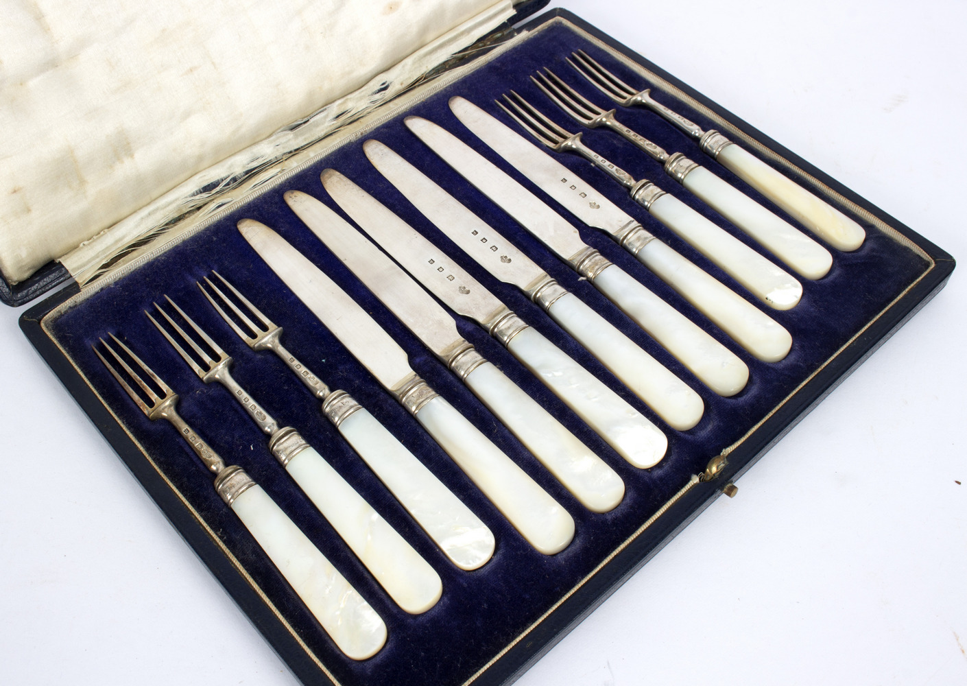 A set of six silver and mother-of-pearl fruit knives and forks, Goldsmiths & Silversmiths Co. - Image 2 of 2