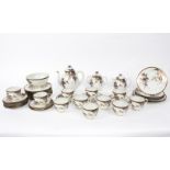 A Japanese eggshell porcelain tea service decorated wisteria, comprising teapot and cover,