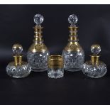 A 19th Century suite of glass decanters in two sizes and a matching tumbler,