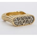 An 18ct yellow gold and diamond signet ring of modern design,