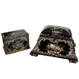 A Victorian papier-mâché tea caddy, the domed cover enclosing two lidded compartments,