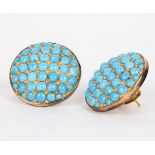 A pair of turquoise and diamond set ear clips of slightly domed circular form set in 18ct gold, 2.