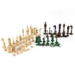 A quantity of carved ivory chess pieces to include stained green and black Condition