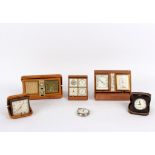 A travel clock, barometer and thermometer by Jaeger Le Coultre, in folding pig skin case,