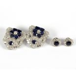 An Art Deco sapphire and diamond double clip brooch and matching cluster ear studs by The