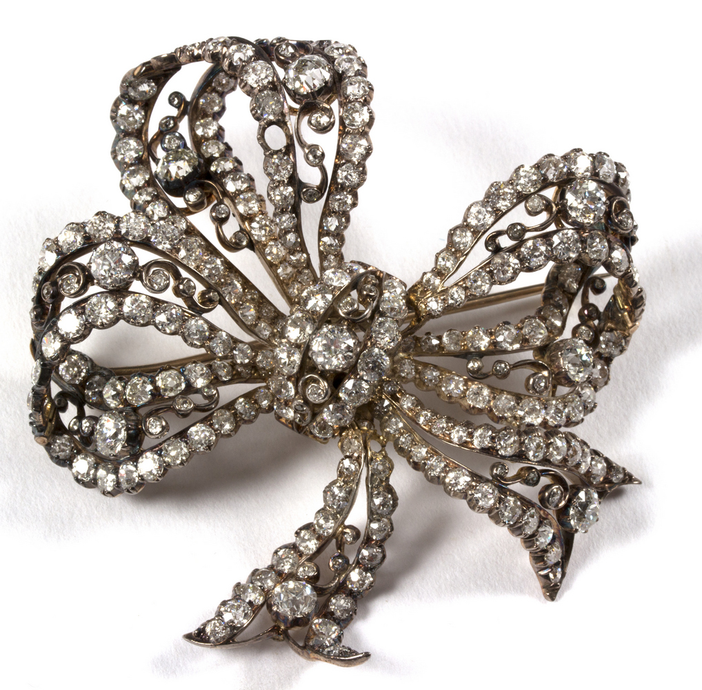 A Victorian diamond bow brooch, possibly adapted, one stone missing, 6cm wide, - Image 2 of 2