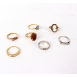 A seven-stone diamond ring set in 18ct gold,