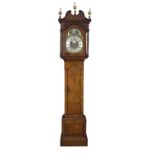 A walnut cased longcase clock, the arch dial signed Brandreth,