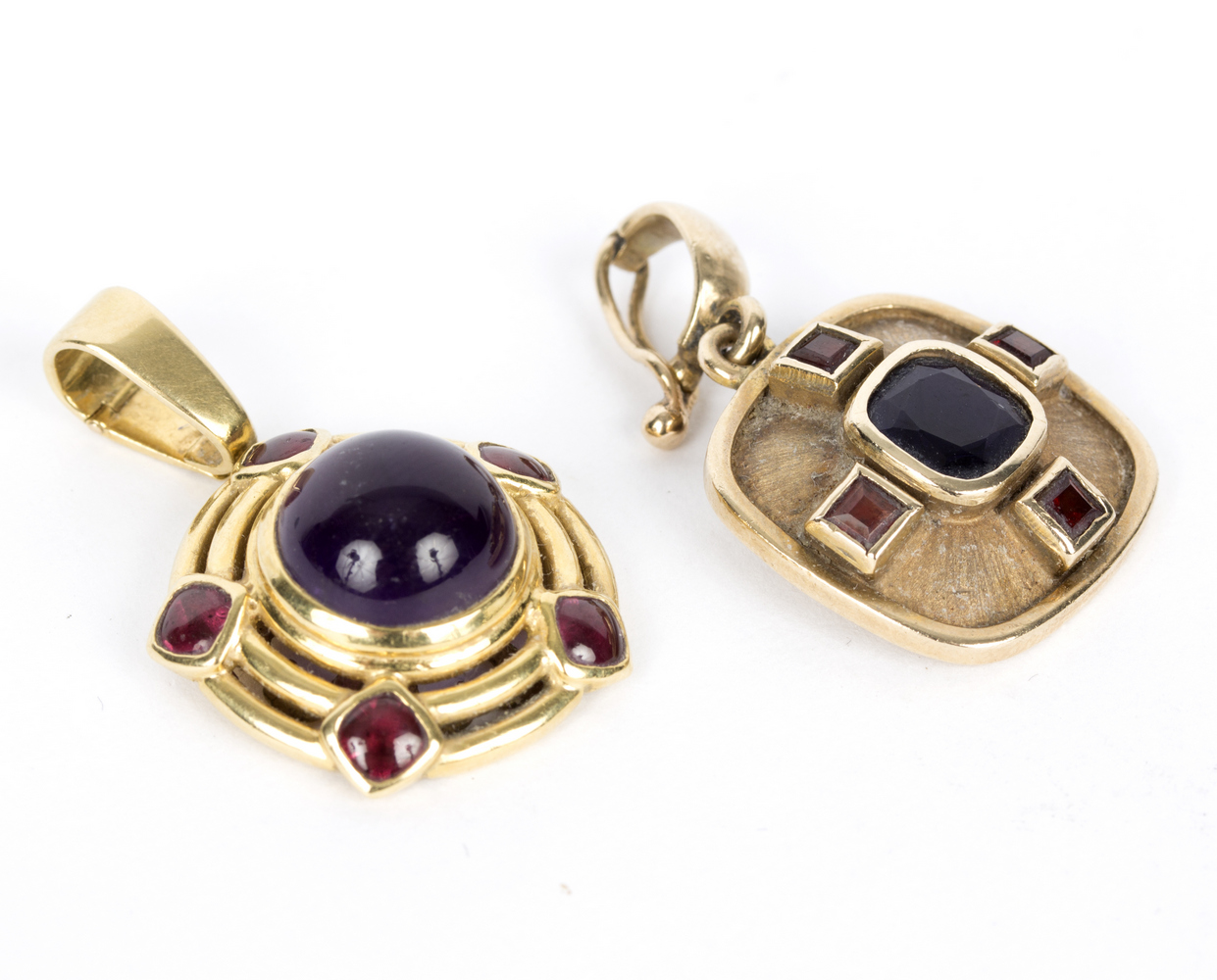 A sapphire and ruby pendant, K & T, circa 2001, set in 9ct gold,