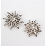 Two Victorian diamond starburst brooches, the larger with central stone approximately 0.5ct, 4.