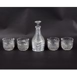 A Regency cut glass decanter and stopper and a set of four wine rinsers,