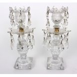 A pair of English cut glass candle lustres, mid 19th Century,