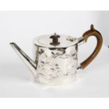 A George III silver drum-shaped teapot, IC, London 1775, 12cm high,