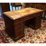 An early 20th century mahogany pedestal desk,