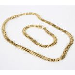An Italian 18ct yellow gold brick link necklace and bracelet, the necklace with damaged clasp,
