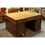 A 19th Century mahogany partners' desk with brown leather set top,