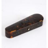 A miniature tortoiseshell violin case,