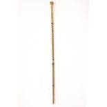 A whalebone walking stick with twist turned reeded decoration/see illustration
