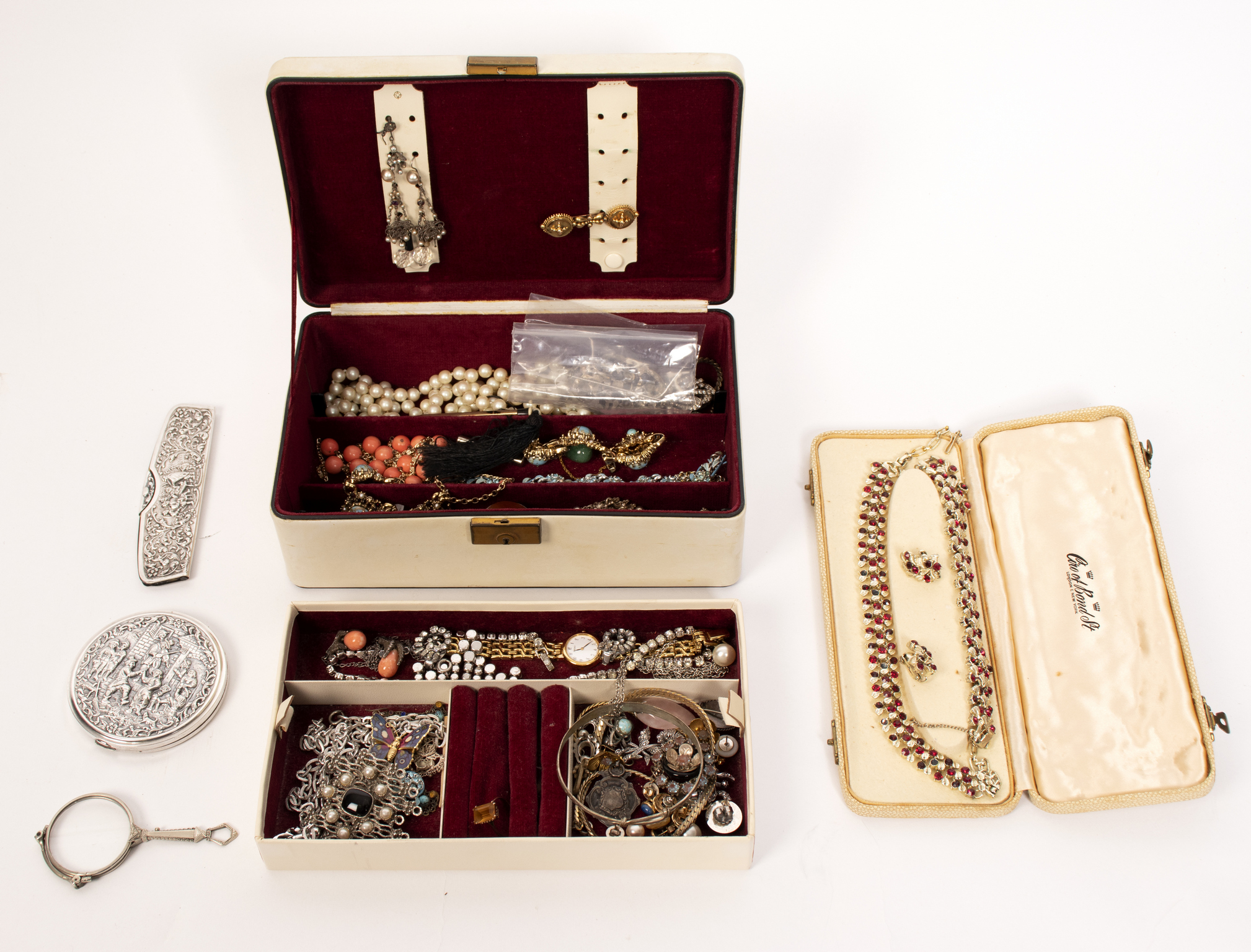 A quantity of costume jewellery including a white metal fringe necklace and a few miniature medals