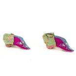 A pair of Chinese shoes in printed and embroidered material, with leather heel and toe,