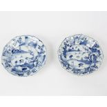 A pair of Chinese kraak style blue and white saucer dishes, Kangxi,