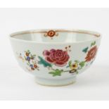 A Chinese famille rose bowl, Qianlong, enamelled with sprays of flowers,