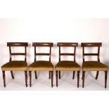 A set of six early Victorian mahogany dining chairs with reeded bar backs and splats,