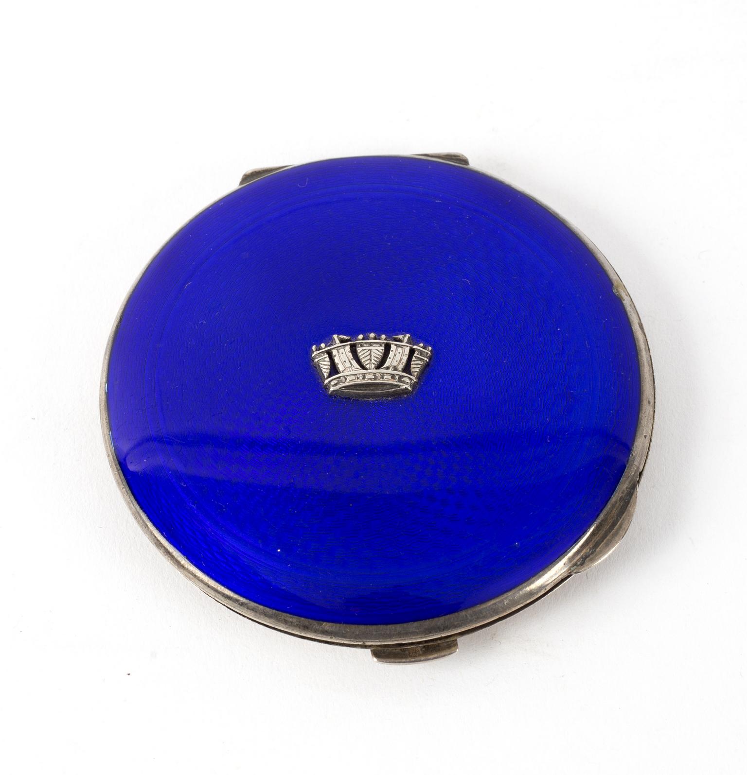 A silver and enamel compact,