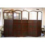 A five-panel four-fold screen with leaded glazed panel to the top,