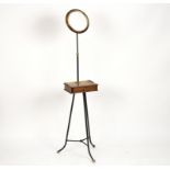 A mahogany shaving stand with adjustable circular mirror,