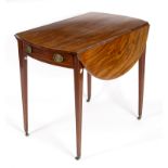 A George III mahogany Pembroke table with boxwood stringing on square tapering legs with barrel