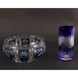 A circular cut glass bowl with blue ribbed reserves,