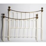A cast iron and brass bedstead with white painted rails,