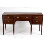 A Regency mahogany and inlaid sideboard on moulded square tapering legs, 175cm wide, 65.