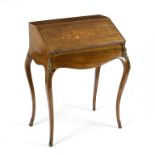 A walnut and marquetry bureau de dame on gilt metal mounted cabriole legs,