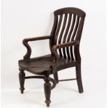A 19th Century open armchair with stick back and crinoline stretcher