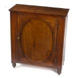 A George III mahogany and inlaid single door cupboard on turned feet,