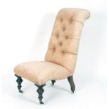 An early Victorian button back nursing chair,